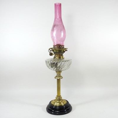 Lot 527 - A 19th century brass oil lamp, with a...