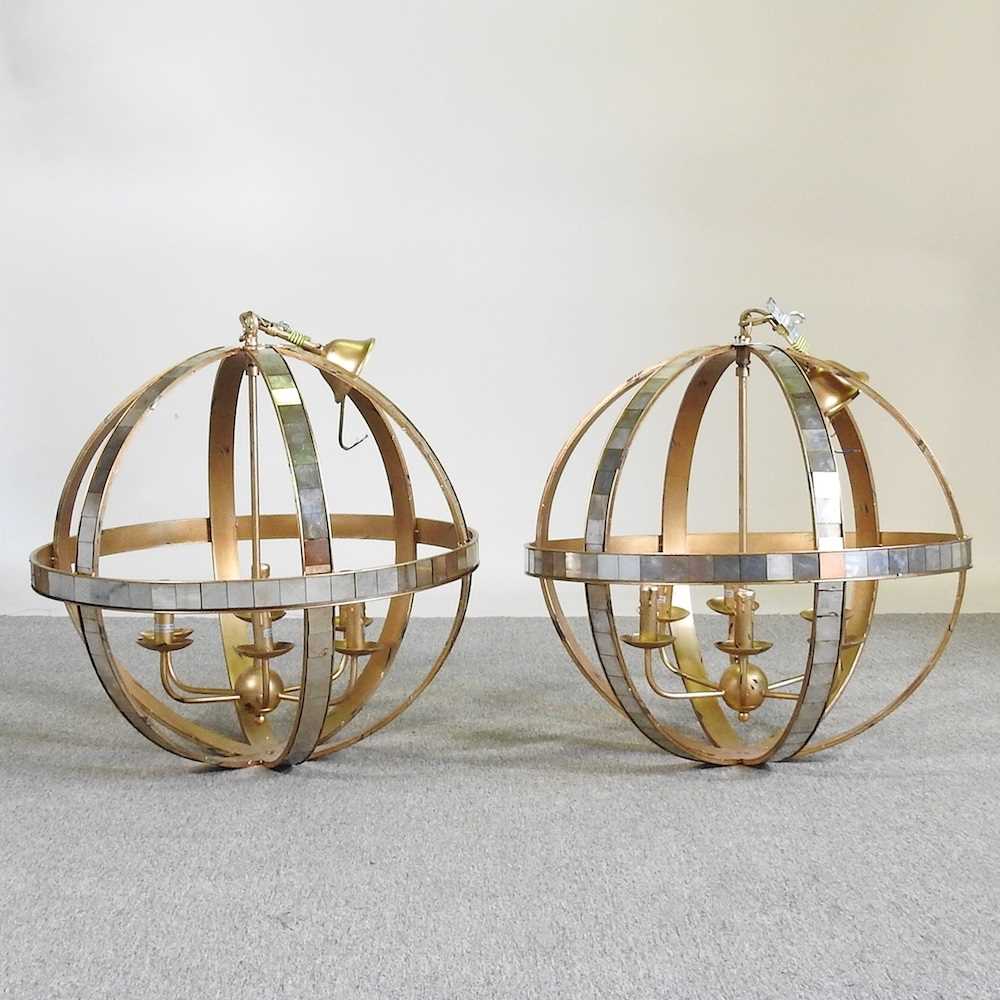 Lot 44 - A large pair of Libra mirrored gilt globe...