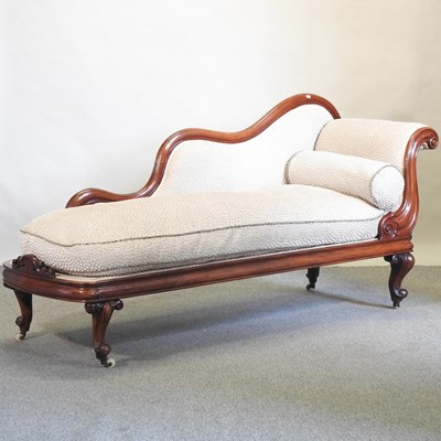 Lot 653 - A 19th century mahogany chaise longue