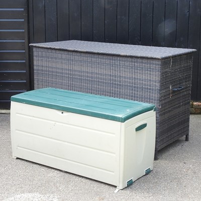 Lot 441 - A rattan garden storage box, together with...