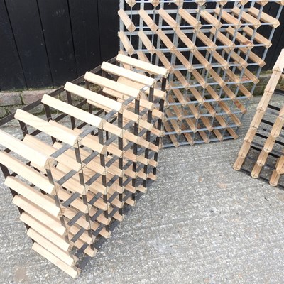 Lot 49 - A wooden and metal wine rack, 71cm, together...