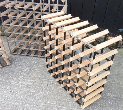 Lot 49 - A wooden and metal wine rack, 71cm, together...