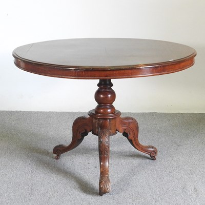 Lot 362 - A Victorian dining table, with a hinged...