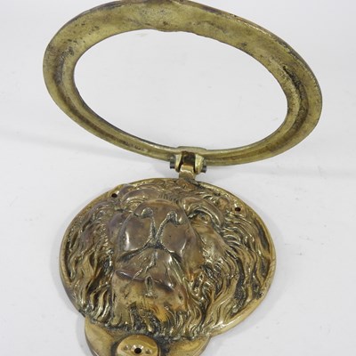 Lot 4 - A large brass lion mask door knocker, 22cm...