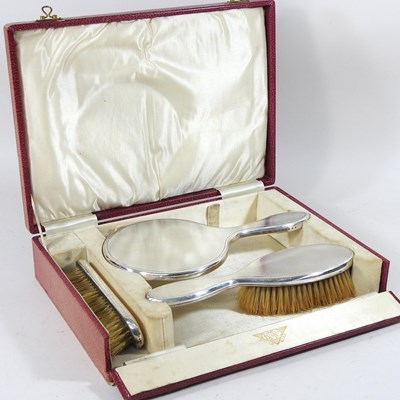 Lot 414 - An early 20th century silver three piece...