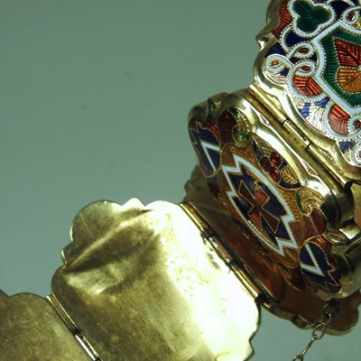 Lot 77 - An Eastern gilt and enamelled bracelet,...