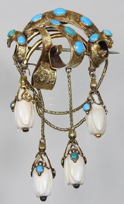 Lot 29 - A 19th century gilt and turquoise brooch, of...