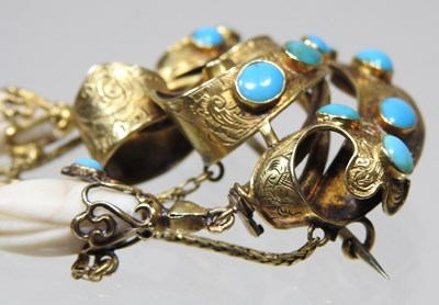 Lot 29 - A 19th century gilt and turquoise brooch, of...