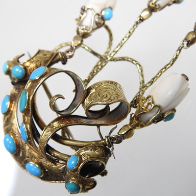 Lot 29 - A 19th century gilt and turquoise brooch, of...
