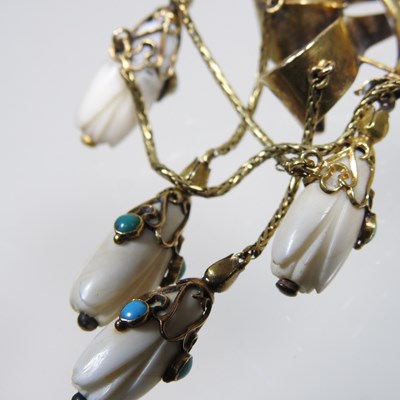 Lot 29 - A 19th century gilt and turquoise brooch, of...