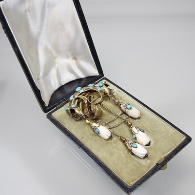 Lot 29 - A 19th century gilt and turquoise brooch, of...