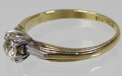 Lot 41 - An 18 carat gold and platinum set single stone...