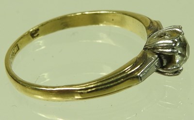Lot 41 - An 18 carat gold and platinum set single stone...