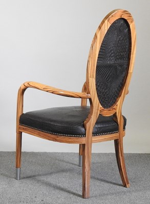 Lot 27 - A modern Italian zebrano open armchair, with...