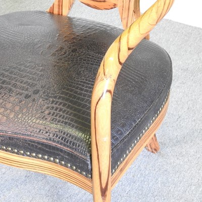 Lot 27 - A modern Italian zebrano open armchair, with...