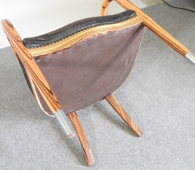 Lot 27 - A modern Italian zebrano open armchair, with...