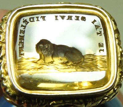 Lot 9 - A 19th century citrine seal, carved with a dog,...
