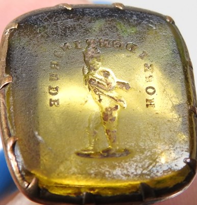 Lot 9 - A 19th century citrine seal, carved with a dog,...