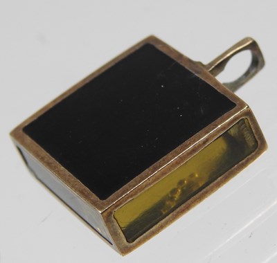 Lot 43 - A Victorian enamelled mourning brooch, with a...