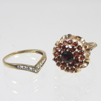 Lot 320 - A 9 carat gold garnet set cluster ring, of...