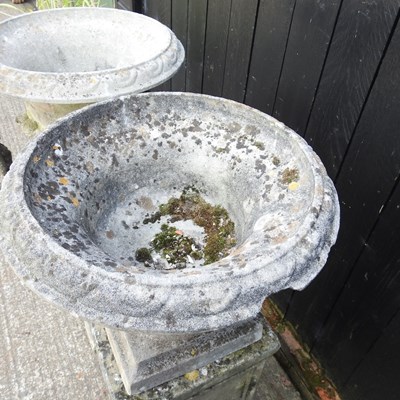Lot 11 - A pair of large cast stone garden urns, each...