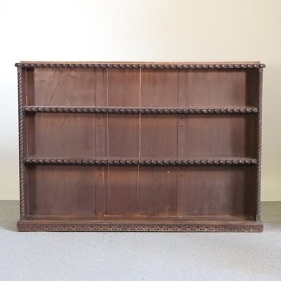 Lot 173 - A 19th century dwarf oak open bookcase, with...