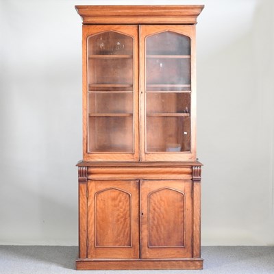 Lot 301 - A 19th century walnut cabinet bookcase