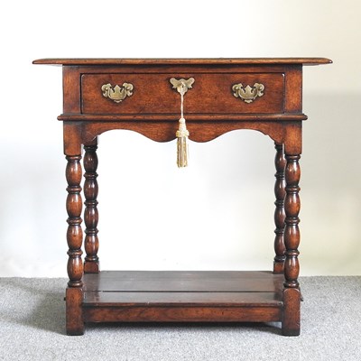 Lot 420 - A 17th century style oak side table, 20th...