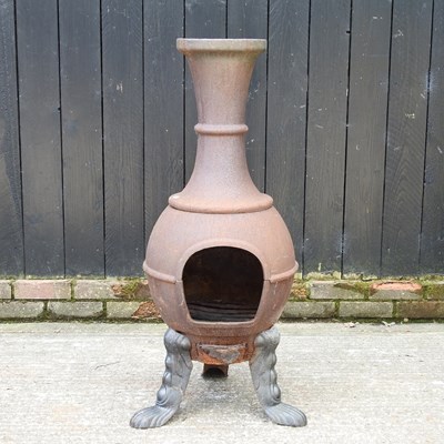 Lot 305 - A cast iron garden chiminea, 111cm high