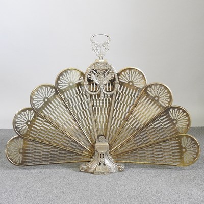 Lot 504 - A Victorian peacock fan fire screen, 68cm high