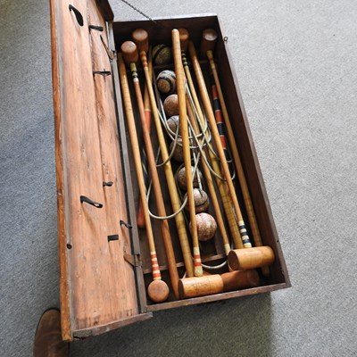 Lot 12 - An early 20th century Ayres croquet set, in a...