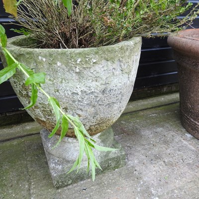 Lot 22 - A pair of large cast stone garden pots, each...