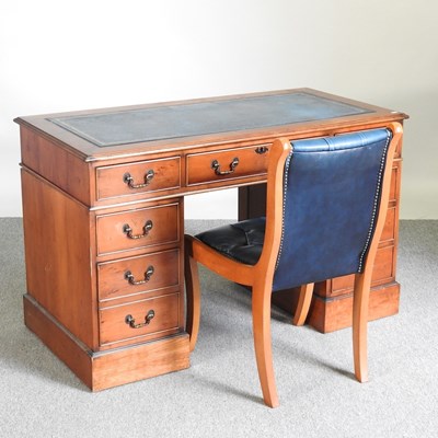 Lot 452 - A reproduction yew wood pedestal desk,...