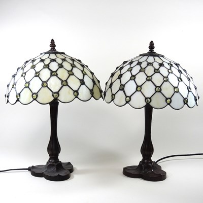 Lot 377 - A pair of Tiffany style table lamps and shades,...