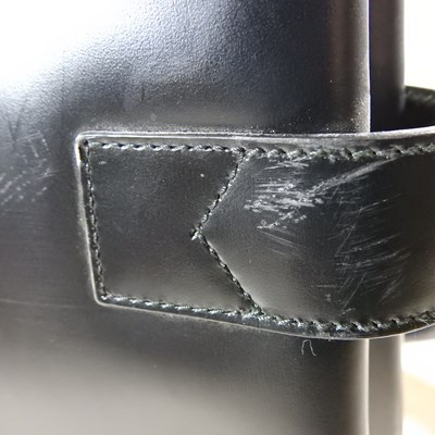 Lot 19 - A Gucci black leather tote handbag, with...