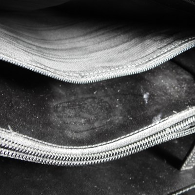 Lot 19 - A Gucci black leather tote handbag, with...