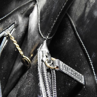 Lot 19 - A Gucci black leather tote handbag, with...