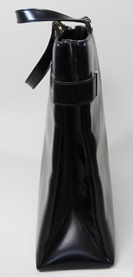 Lot 19 - A Gucci black leather tote handbag, with...