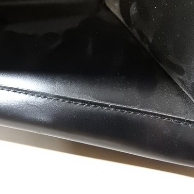 Lot 19 - A Gucci black leather tote handbag, with...