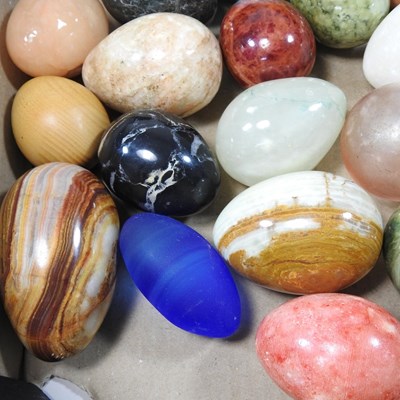 Lot 13 - A collection of various polished hardstone eggs