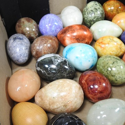 Lot 13 - A collection of various polished hardstone eggs