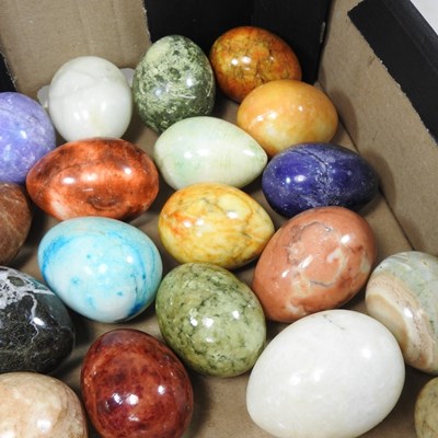 Lot 13 - A collection of various polished hardstone eggs