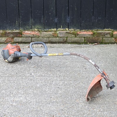 Lot 509 - A Husqvarna petrol strimmer