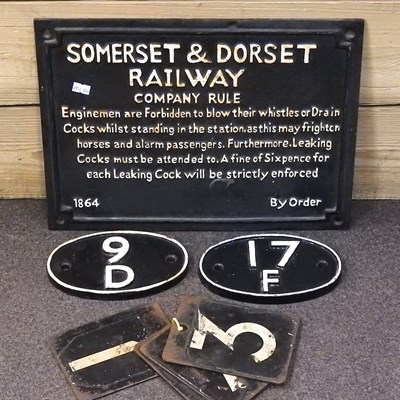 Lot 486 - A cast iron railway information sign, together...