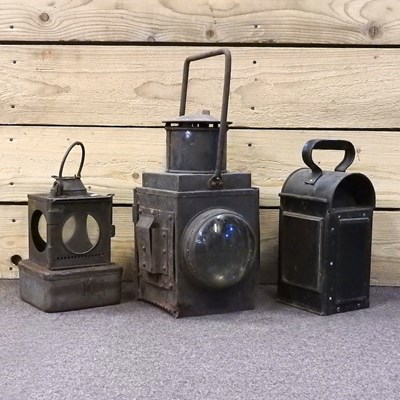Lot 488 - A railway lantern, together with two others (3)