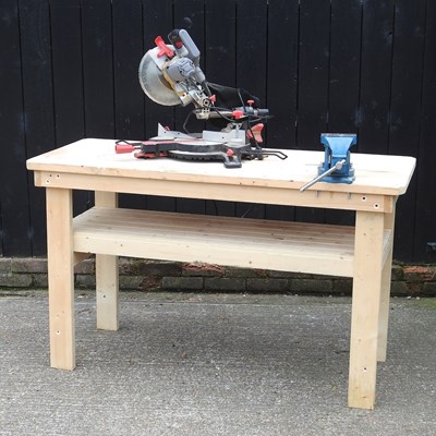 Lot 562 - A wooden workshop bench, fitted with a vice,...