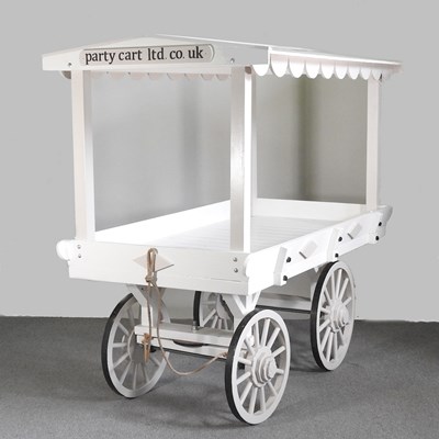Lot 536 - A large white painted wooden party or street...