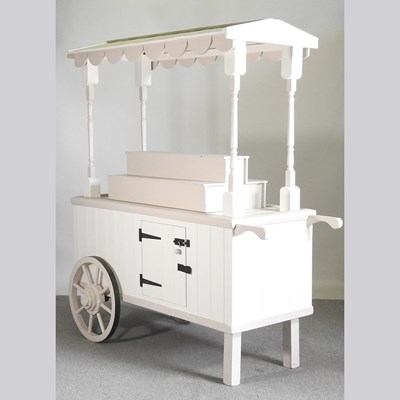 Lot 513 - A white painted wooden party or street...