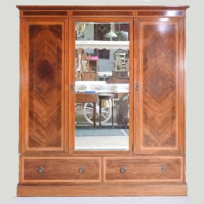 Lot 317 - An Edwardian mahogany and inlaid triple...