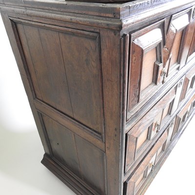 Lot 15 - A large late 17th century oak chest, in two...